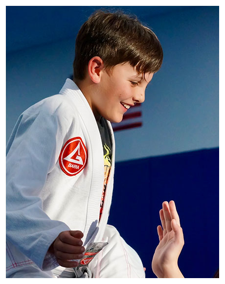 Youth participating in Brazilian Jiu Jitsu program