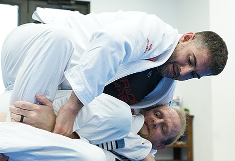 two men in a Brazilian Jiu Jitsu class